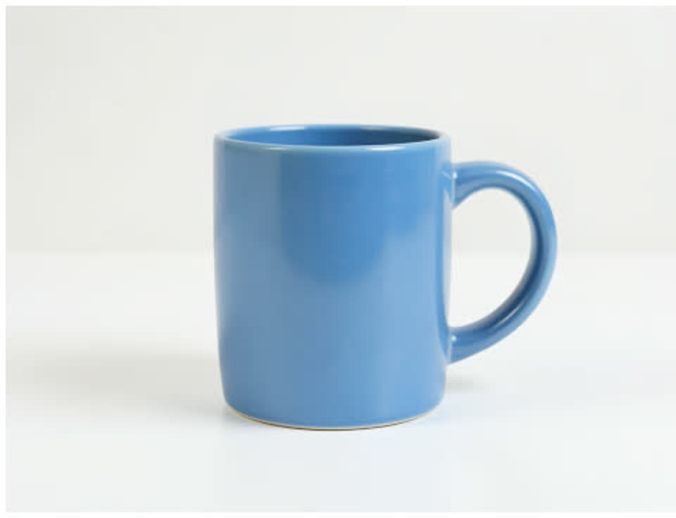 Reference image: a blue ceramic mug on a white table